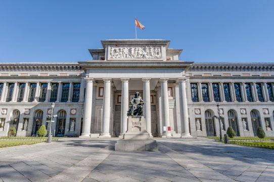 prado,museum,facade,and,cervantes,statue,in,madrid,,spain