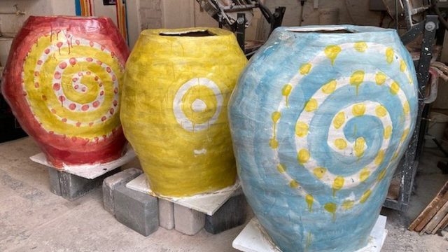 earth goddess, sandy brown