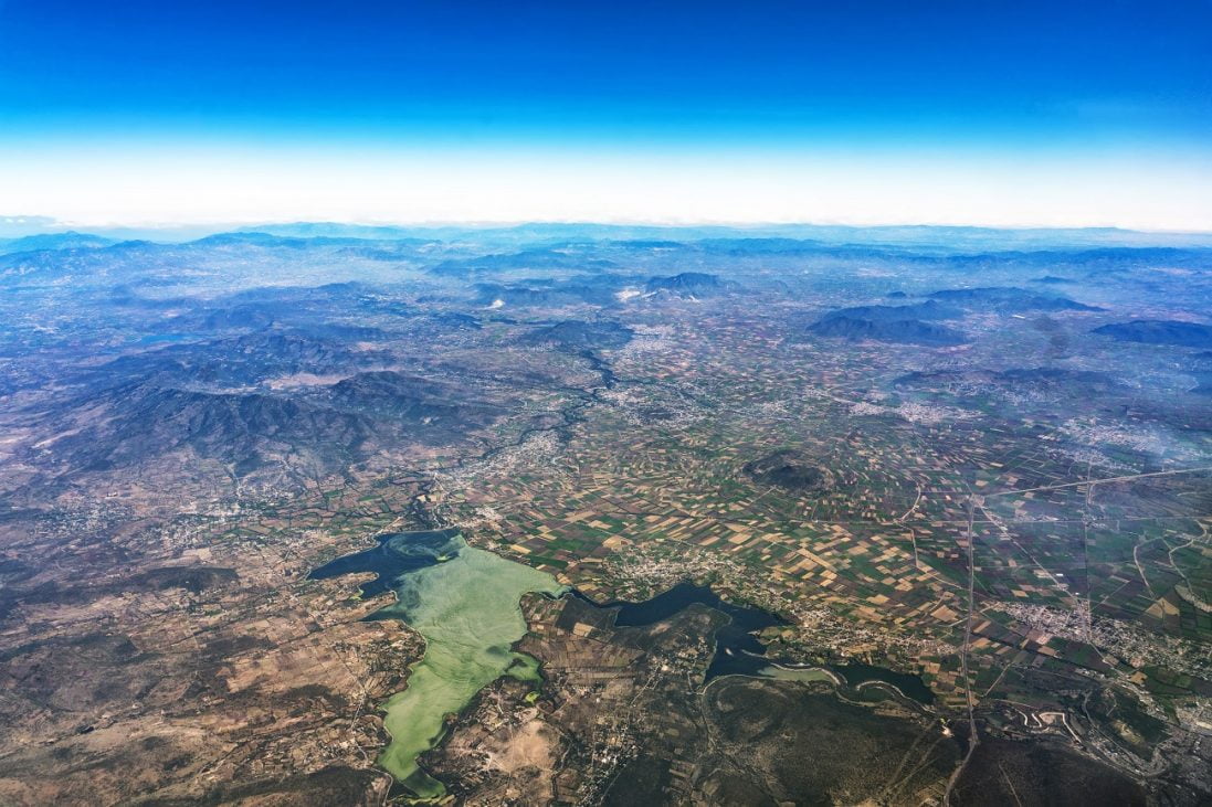lake,texcoco,farmed,fields,and,mountains,near,mexico,city,aerial