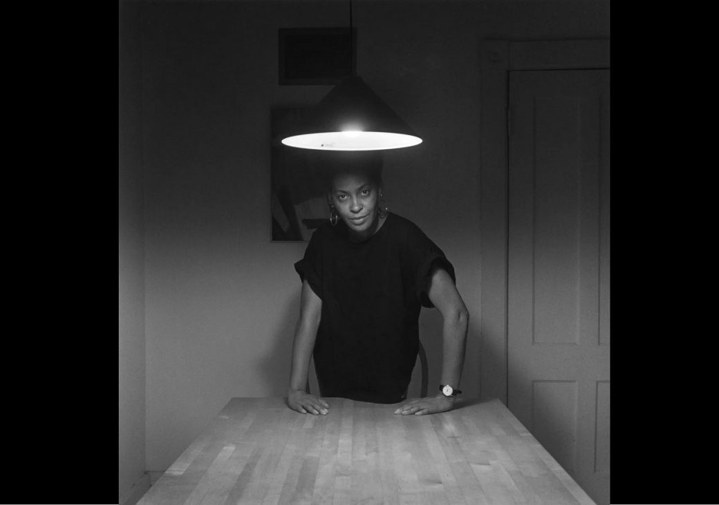 kitchen table woman standing alone, 1990, carrie mae weems
