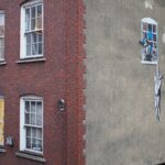 bristol,uk february,25,2016:,graffiti,of,the,street,artist,banksy,called,'naked