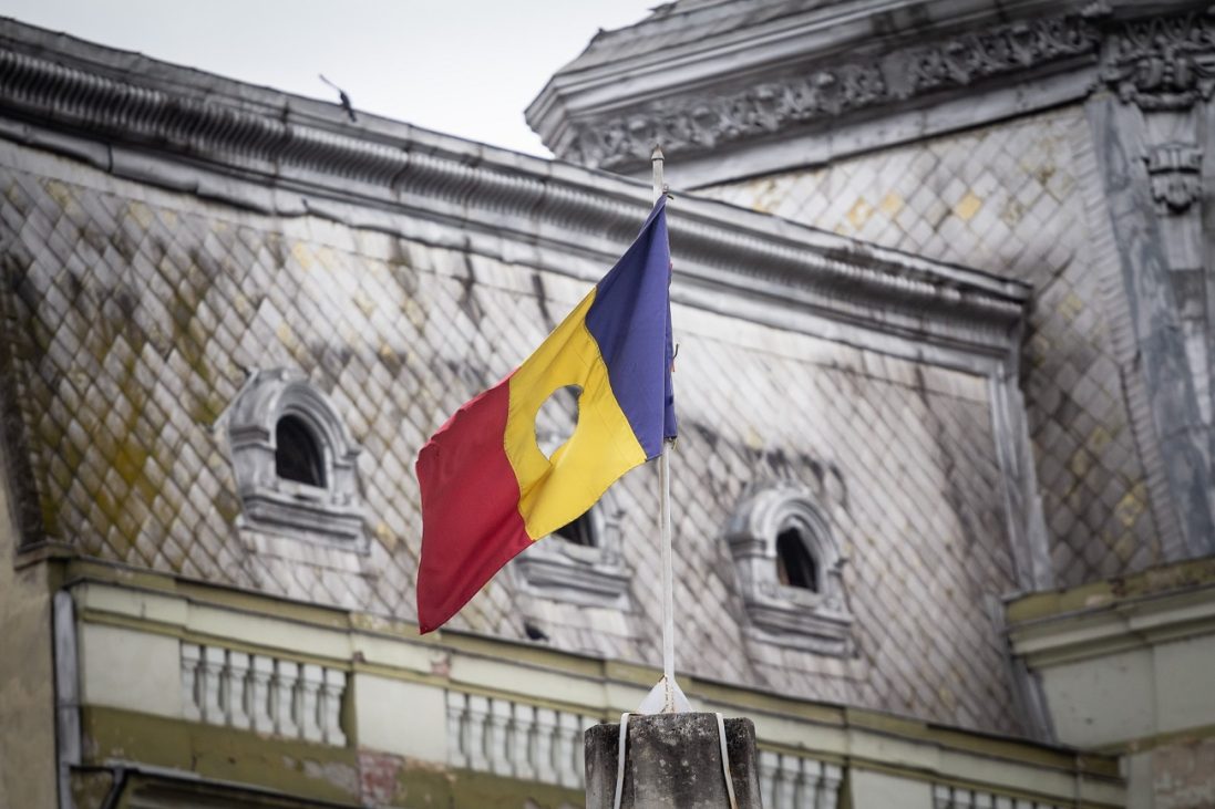 romanian,revolutionary,flag,with,a,hole,,also,called,drapelul,romaniei