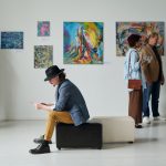 group,of,people,visiting,gallery,of,modern,art,,they,watching